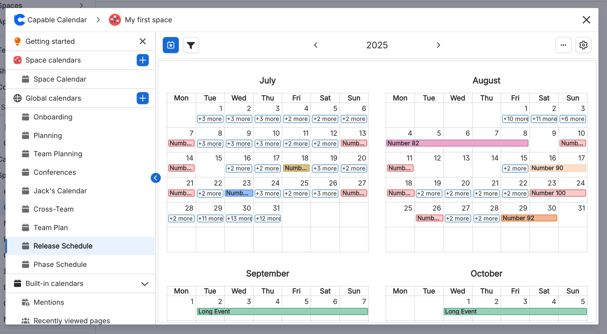 Year view for 2025 showing month grids for July, August, September and October, with plus more labels on the busier days.