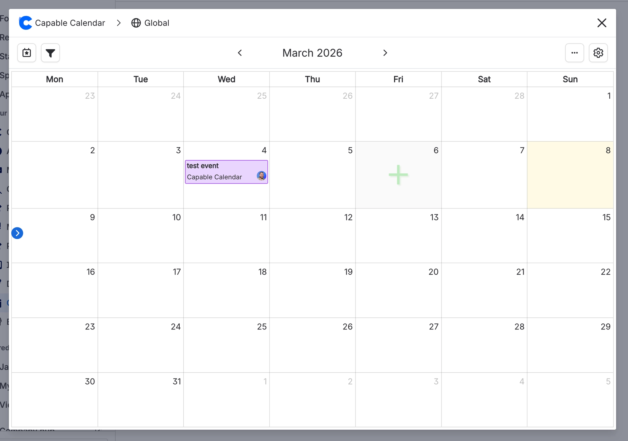 A global Capable calendar in month view for March 2026 with a green plus sign on an empty day.