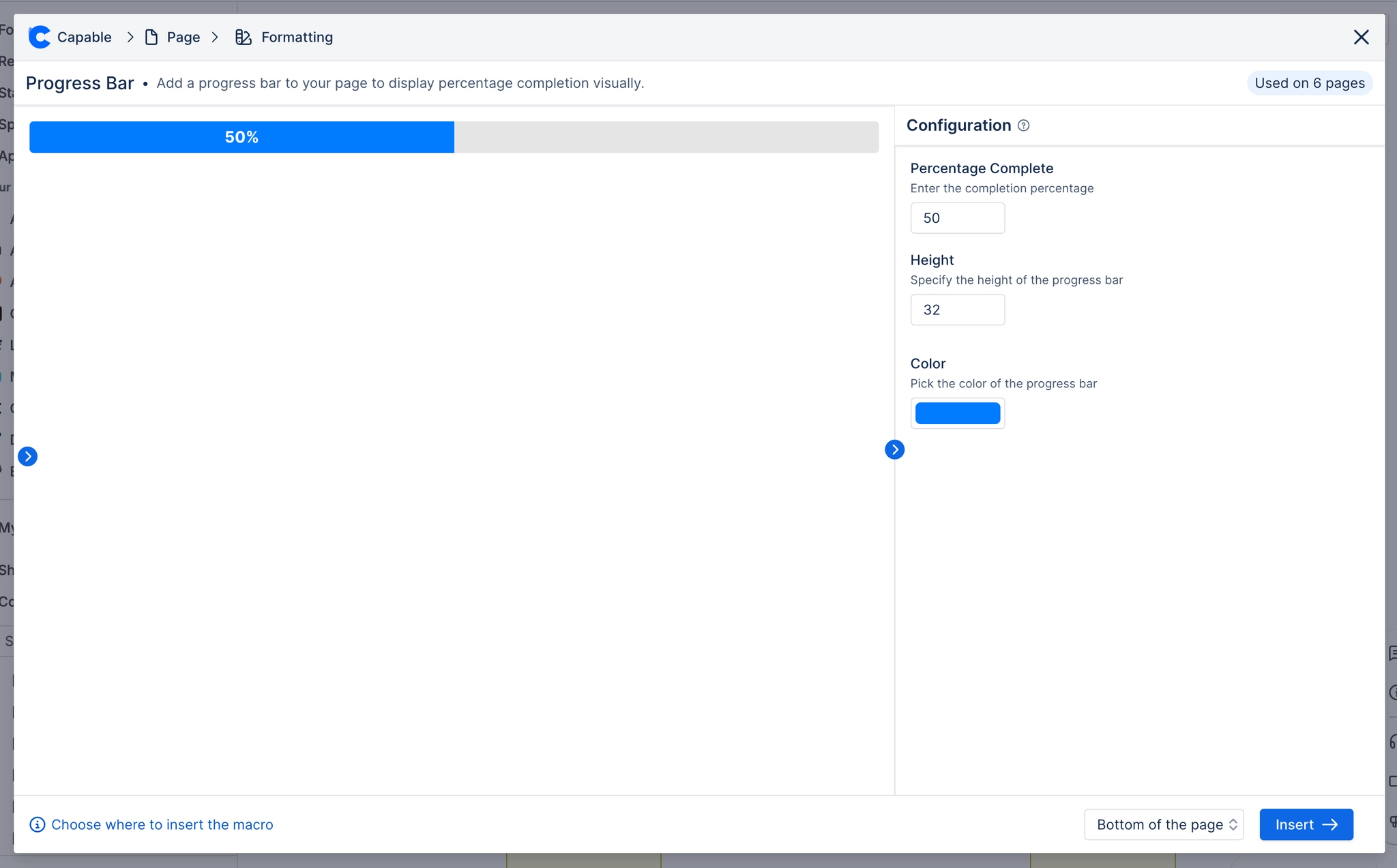 The Progress bar configuration panel with percentage complete set to 50, height set to 32 and a blue colour swatch, and a half filled blue bar previewed to the left.
